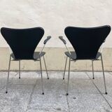 Pair of Arne Jacobsen series 7 chairs in black leather