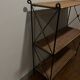 Rattan and wrought iron shelf