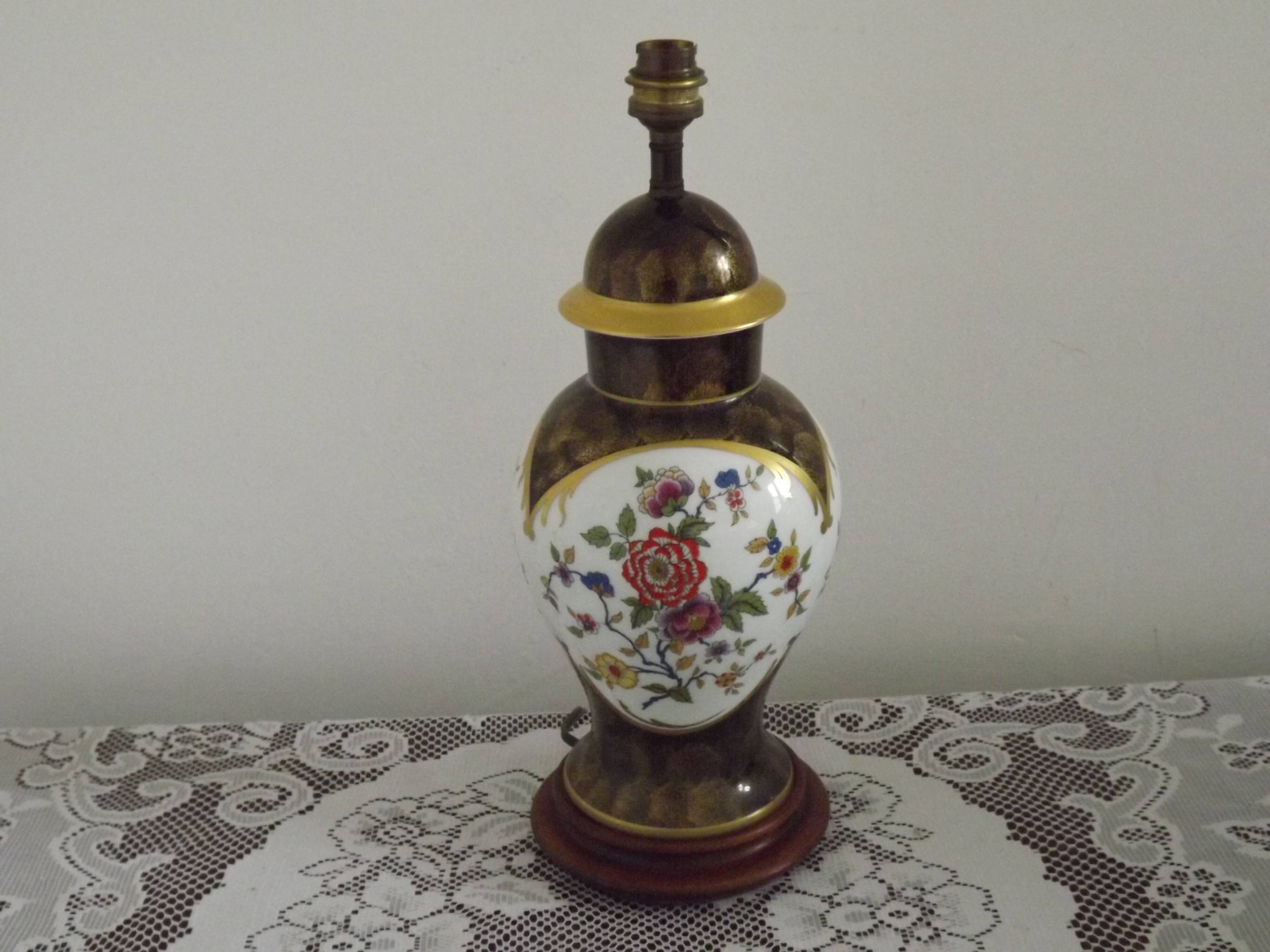 French Limoges Hergé table lamp base with gold highlights and floral decoration.