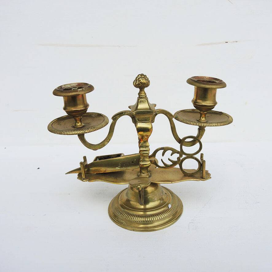 Antique 2-light candelabrum with scissors in bronze or brass.
