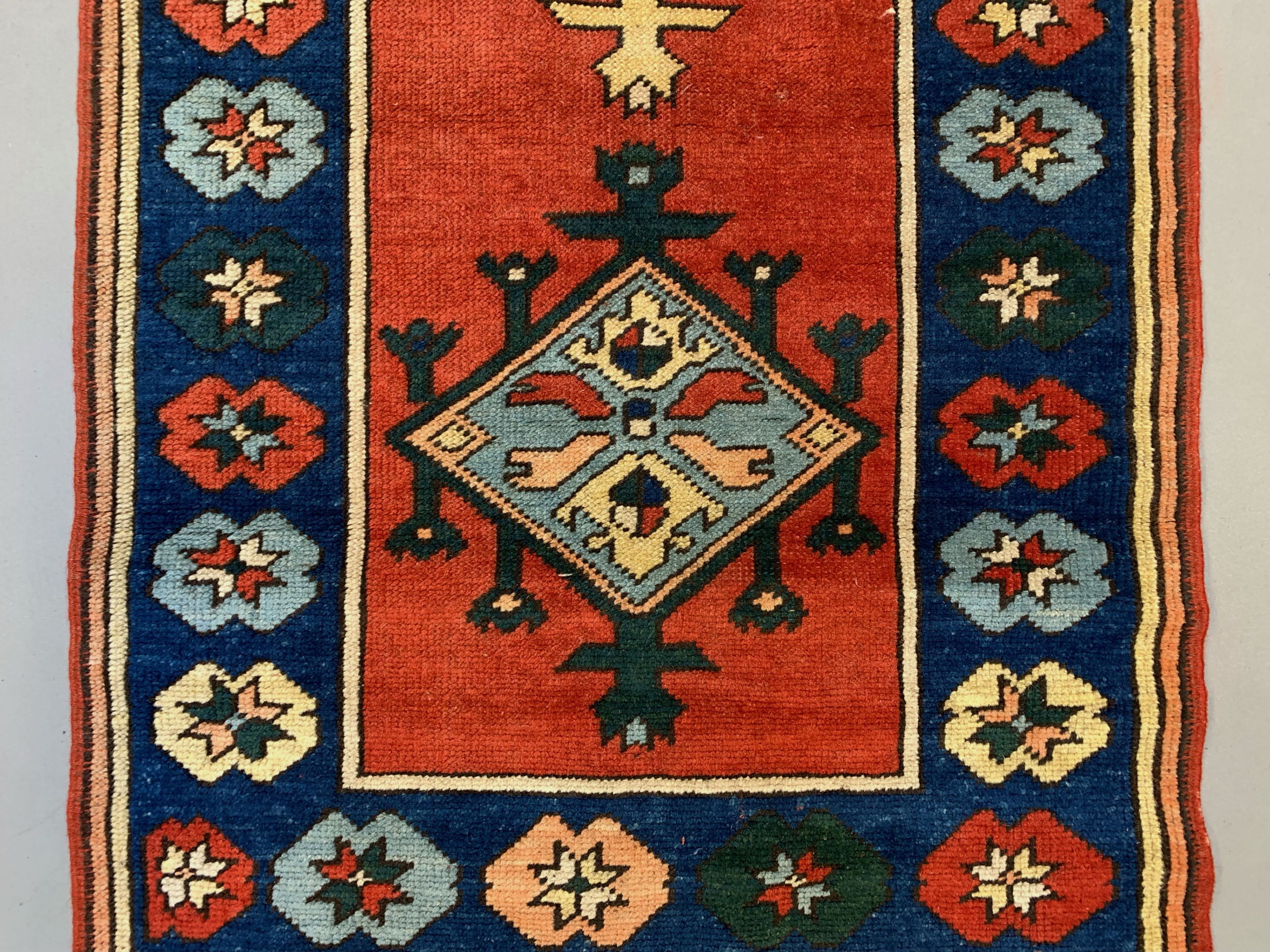 Vintage turkish runner 300x83 cm kazak rug, terracotta red, green, beige blue