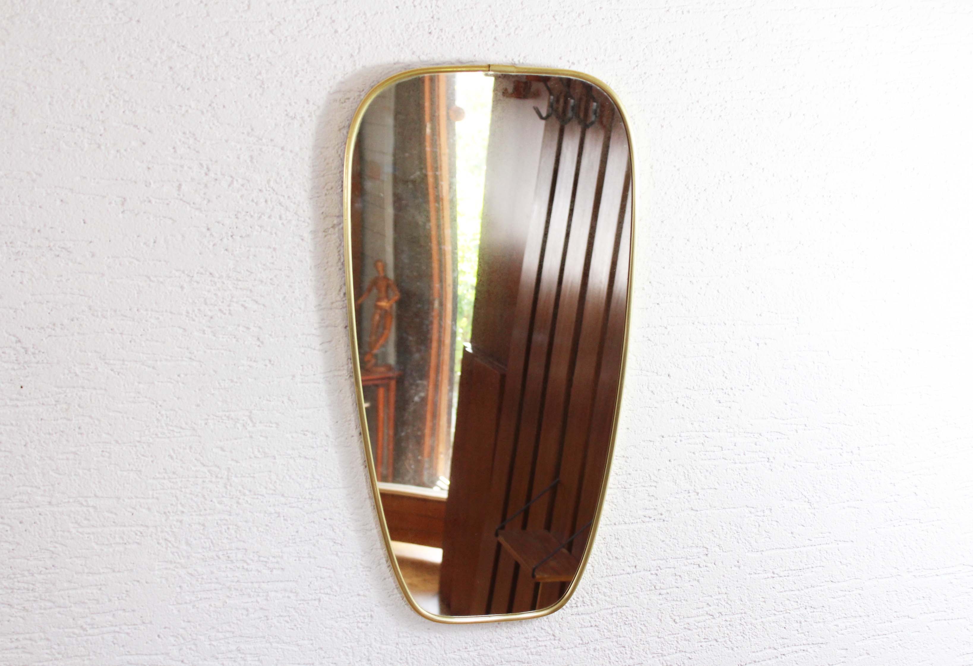 Asymmetrical mirror brass 60x31cm