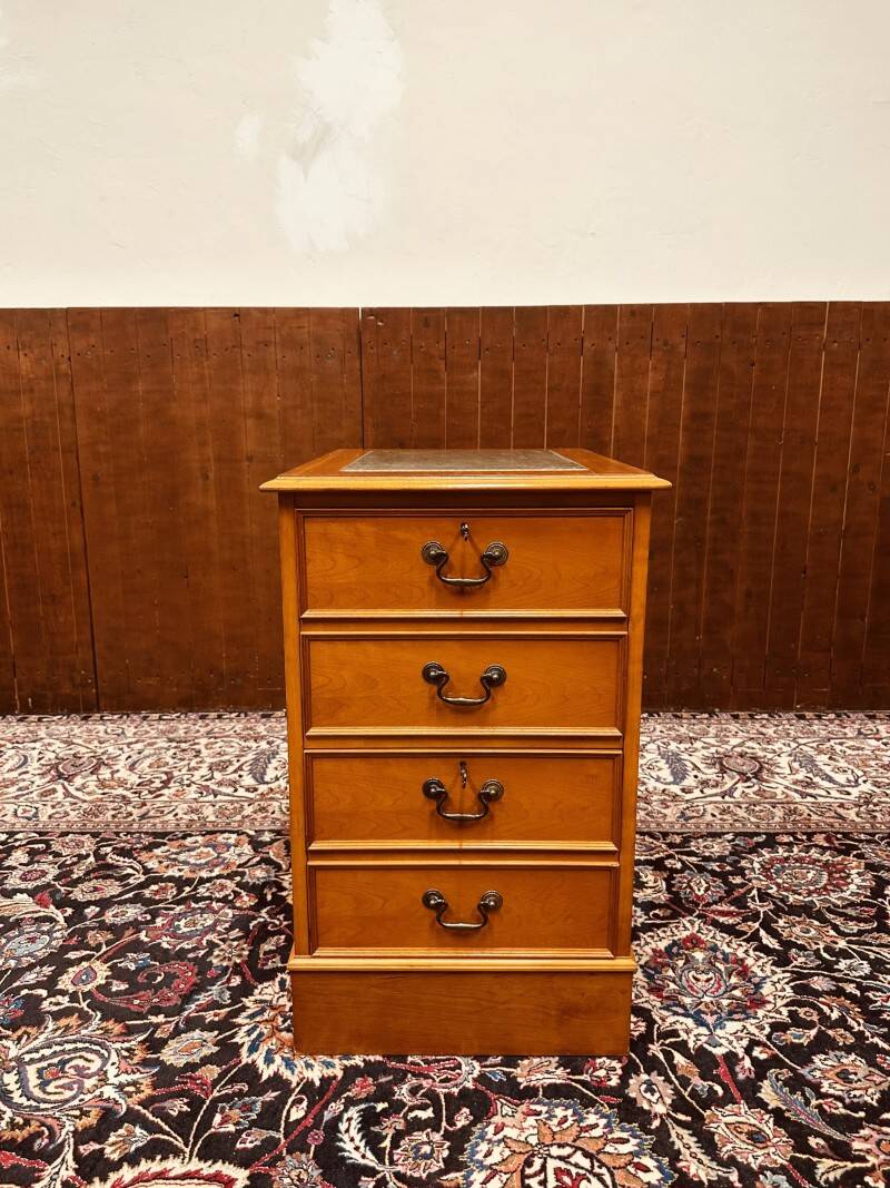 Classic English Chest of Drawers with leather inlay