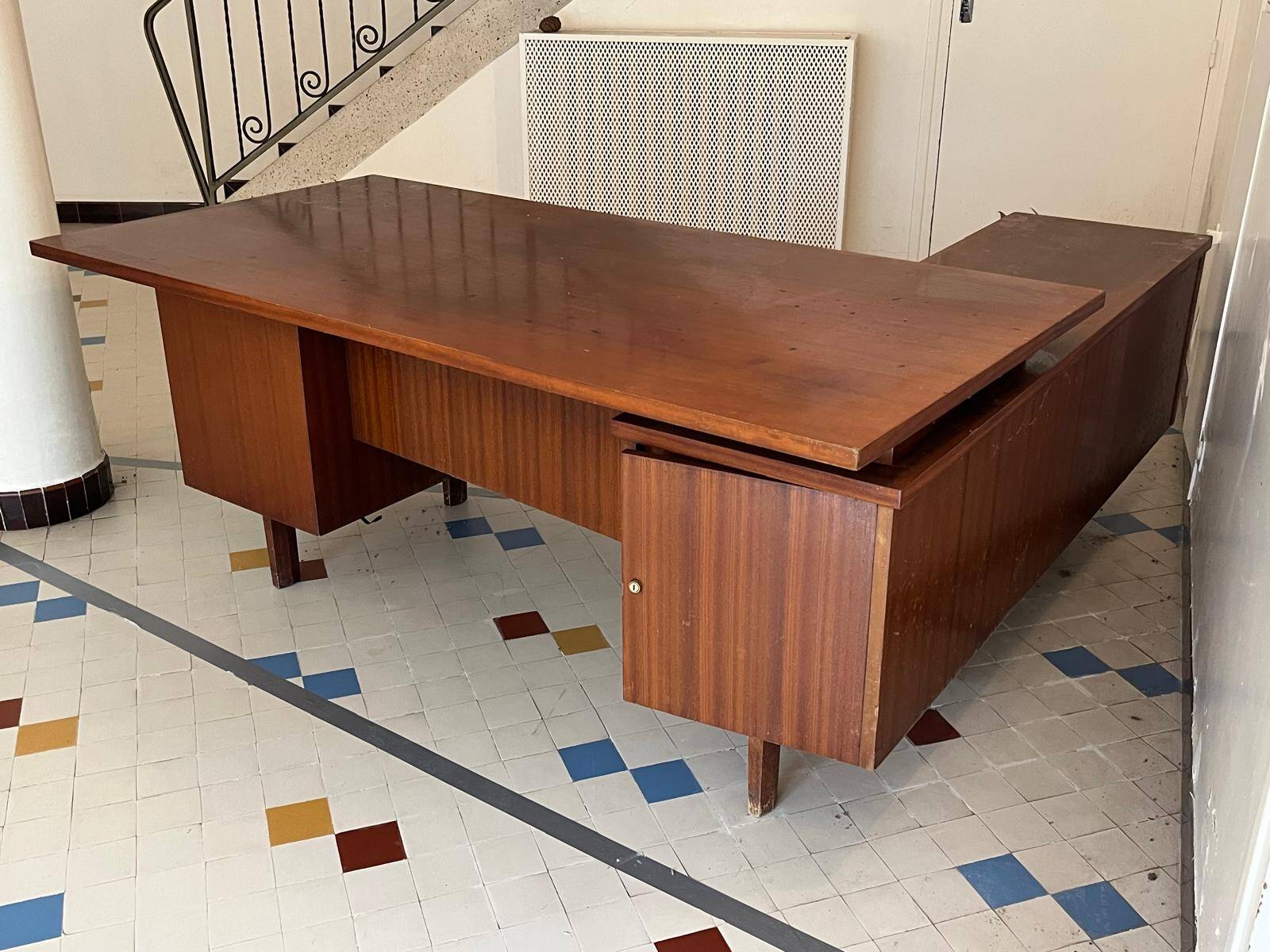 Vintage mahogany executive desk with bar.