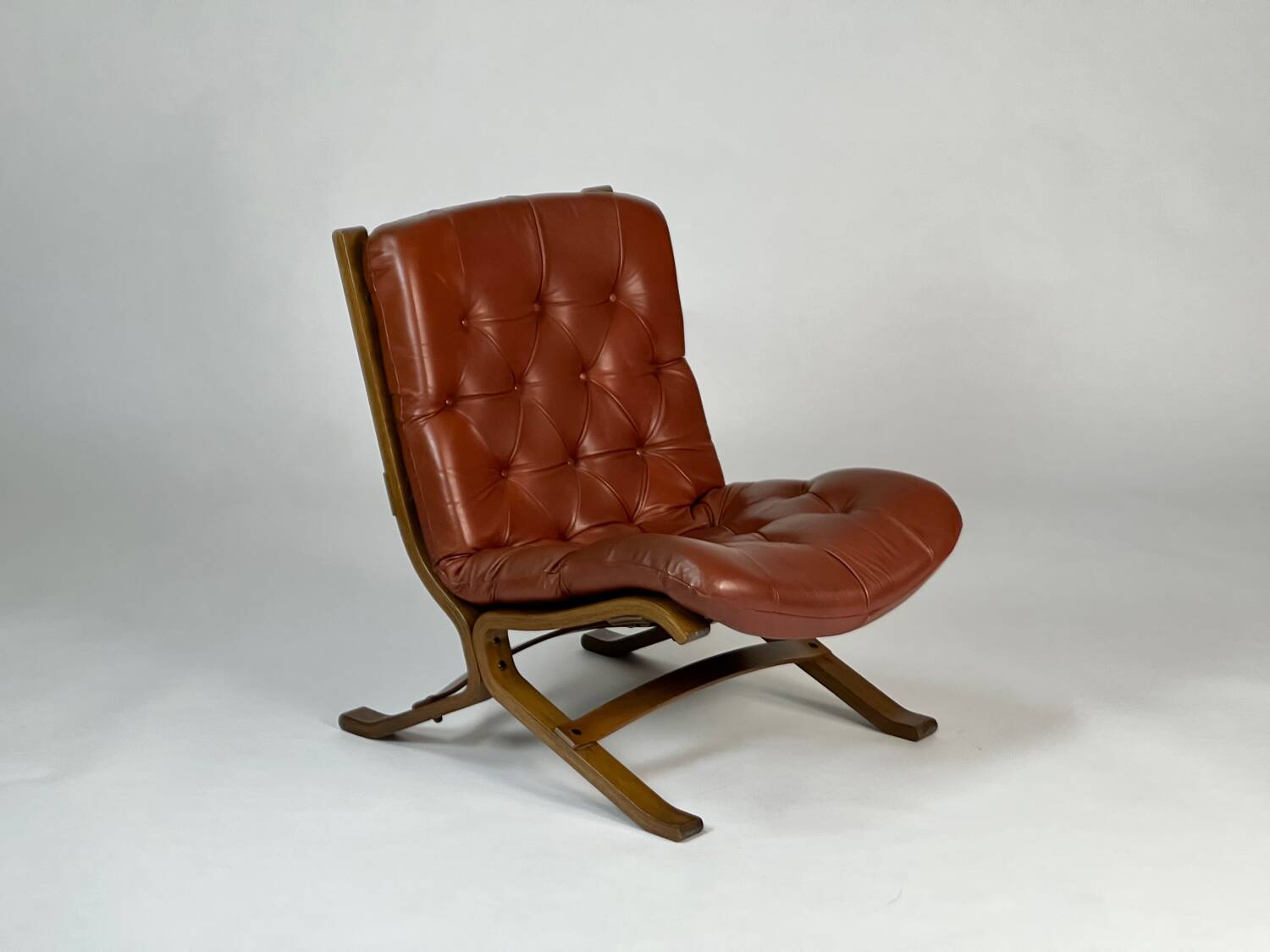 Vintage armchair easy chair leather 70s in the style of Ingmar Relling