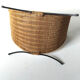 Rattan basket with logs