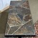 Coffee table in wrought iron with a slate top, work from the 1950s.