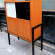 Bookcase, coloured windows, metal base, 1960