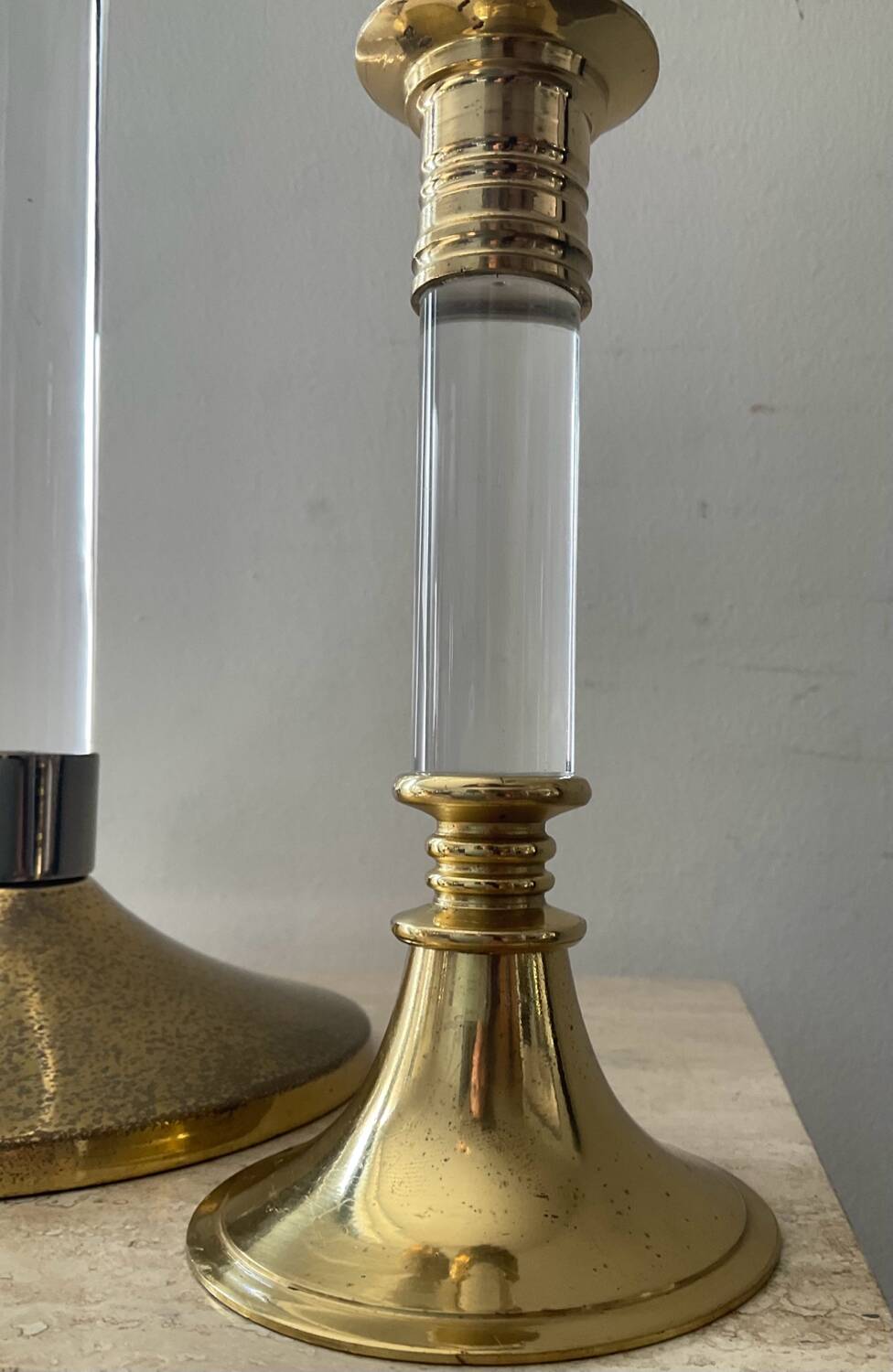 Duo of vintage brass and lucite candlesticks