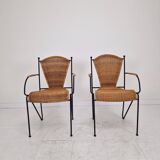 Pair of wicker and iron armchairs by Frederic Weinberg, United States, 1950s.