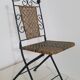Chaise en fer forgé et rotin,  pliante  et vintage