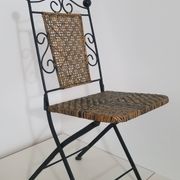 Chaise en fer forgé et rotin,  pliante  et vintage