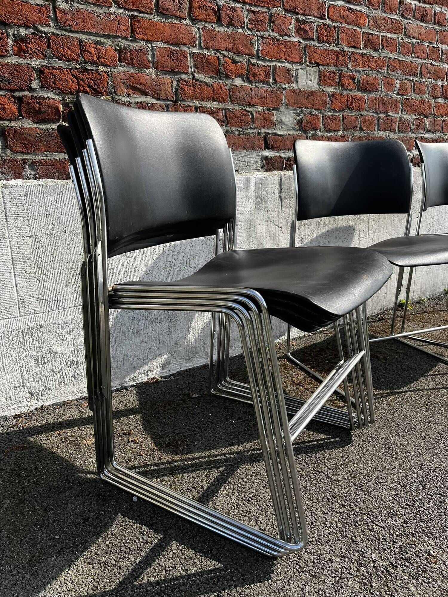 Set of 6 black metal chairs, model GF 40/4 by David Rowland.