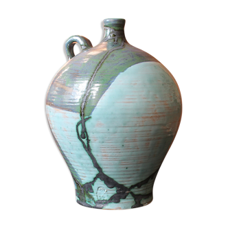 Ceramic jug with the stamp of the author