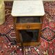 Nightstand in walnut with a white marble top, 19th century.