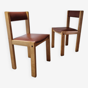 Pair of vintage blond wood and skai chairs