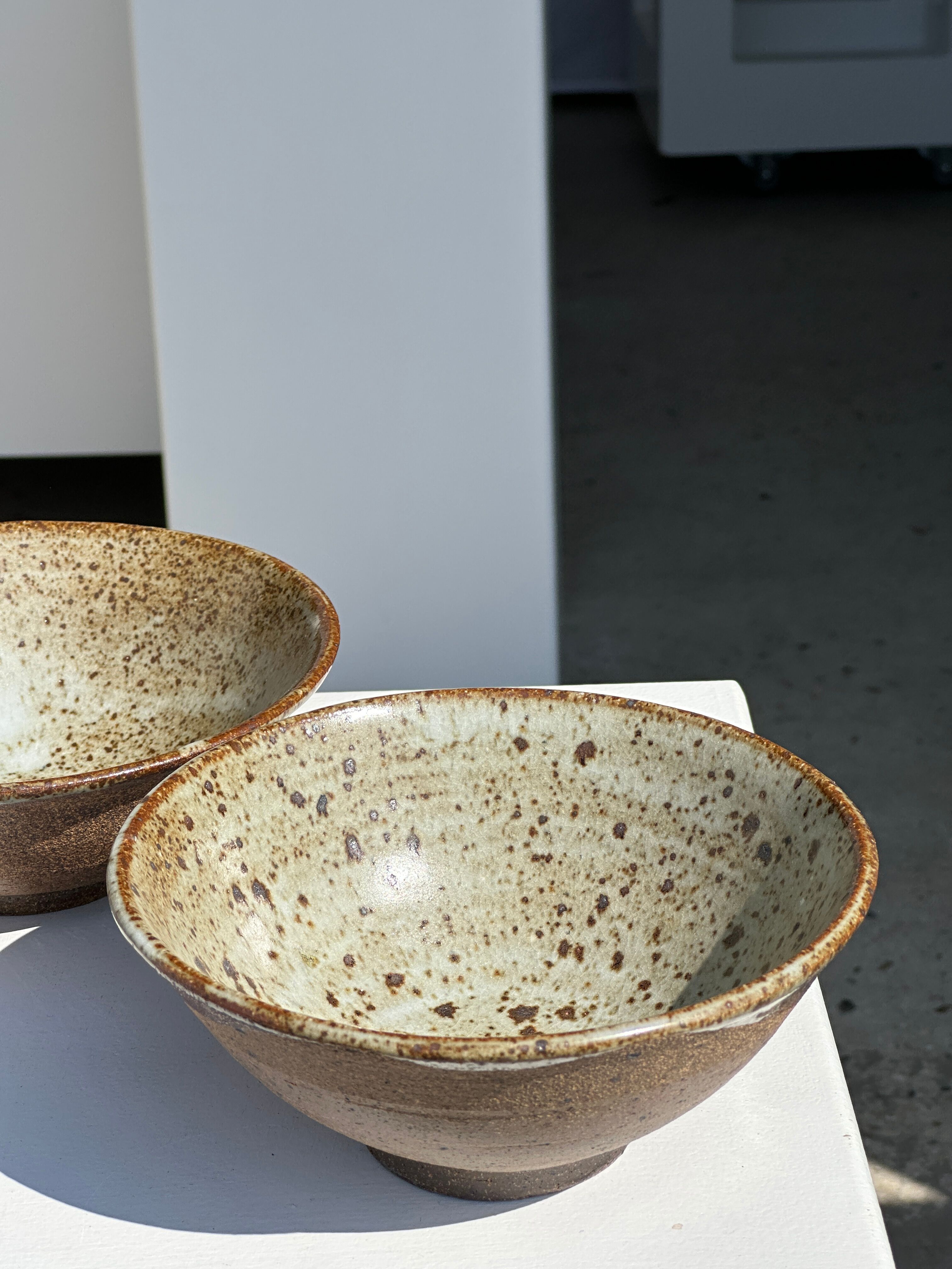 Duo of ceramic bowls interior glazed exterior matt raw earth