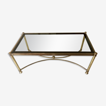 Coffee table in glass and gold metal