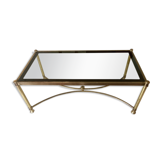 Coffee table in glass and gold metal