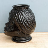 Molded glass vase, nubian's head