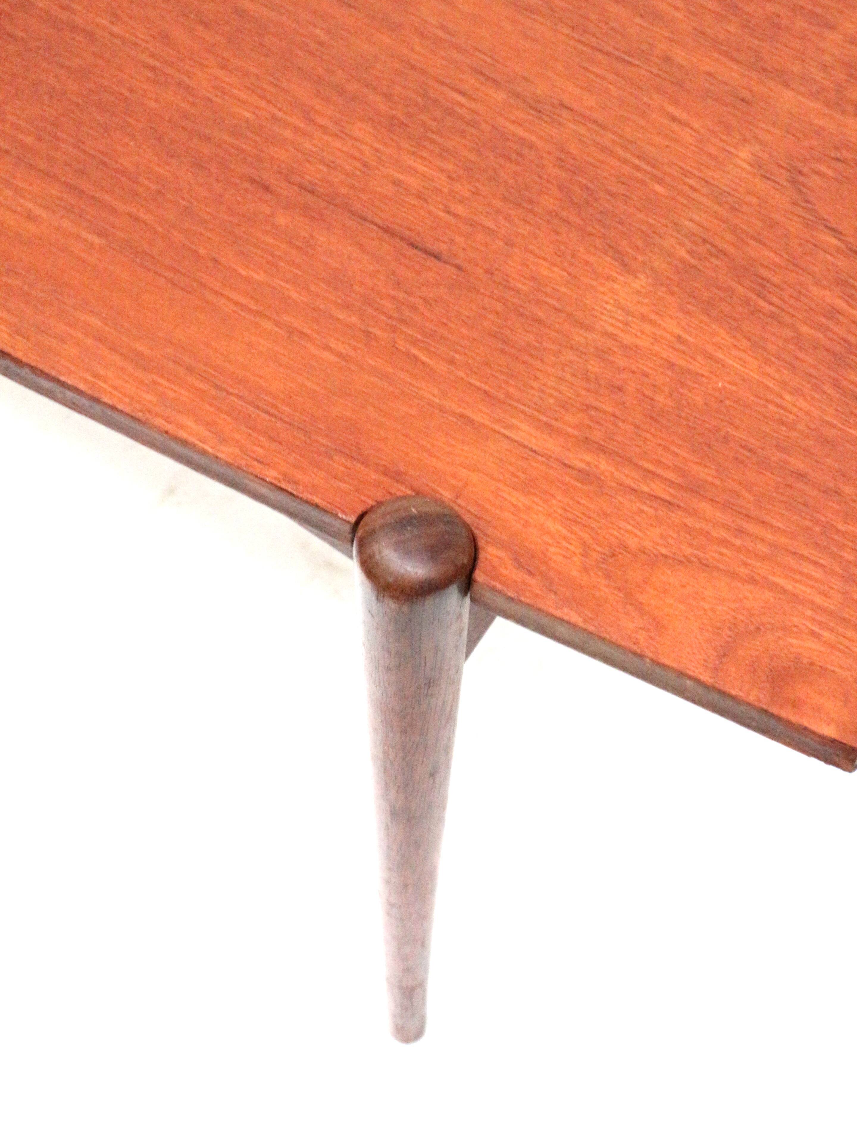 Vintage coffee table with reversible teak and formica top from the 60s