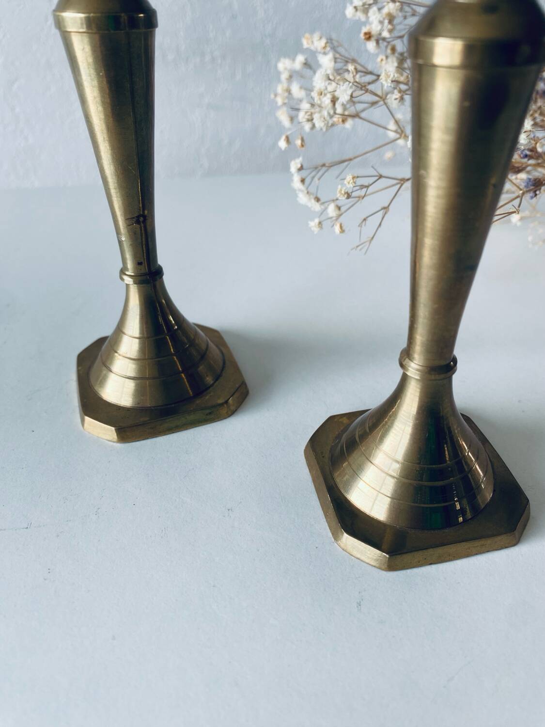 Pair of Indian brass candlesticks