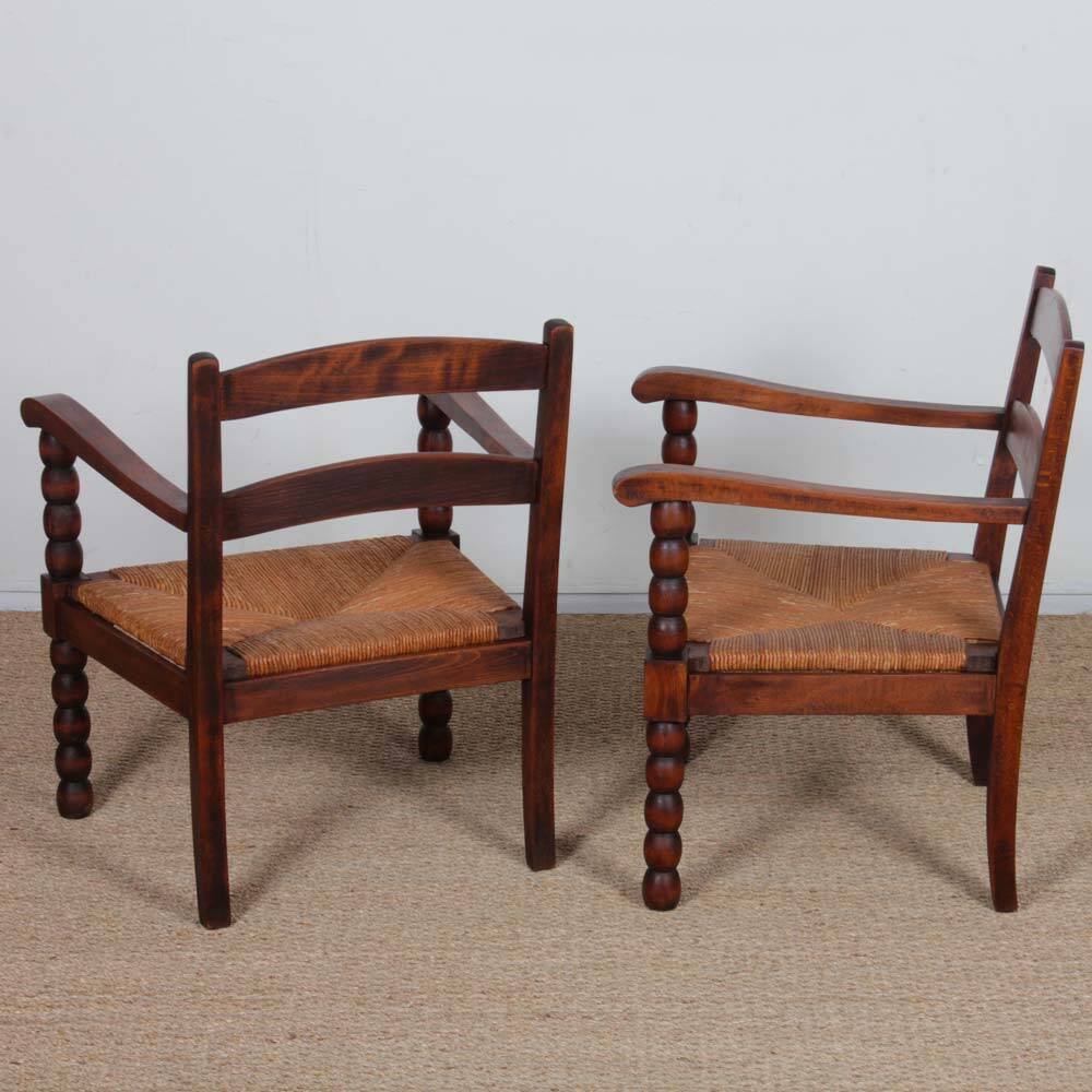 Pair of oak and straw armchairs from the 1940s