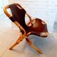 Vintage armchair in rattan and imitation leather 60s