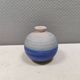 A small, round, beautiful ceramic vase from Denmark, dating from the 1980s.