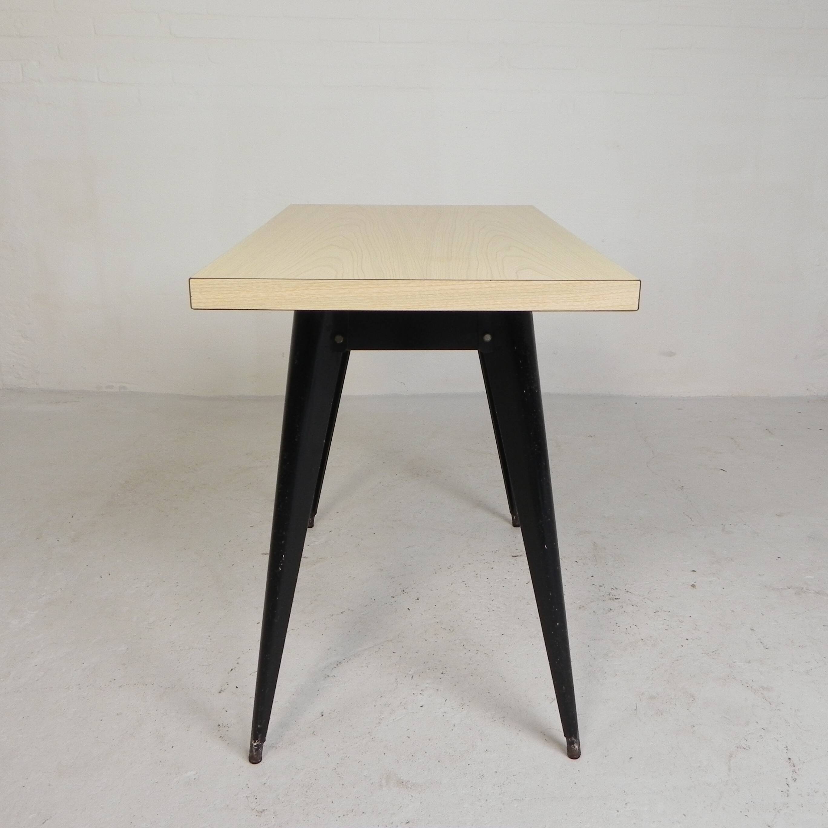 Bistro table Henri Julien, model Tolix T55 with a Formica top, 1950s.
