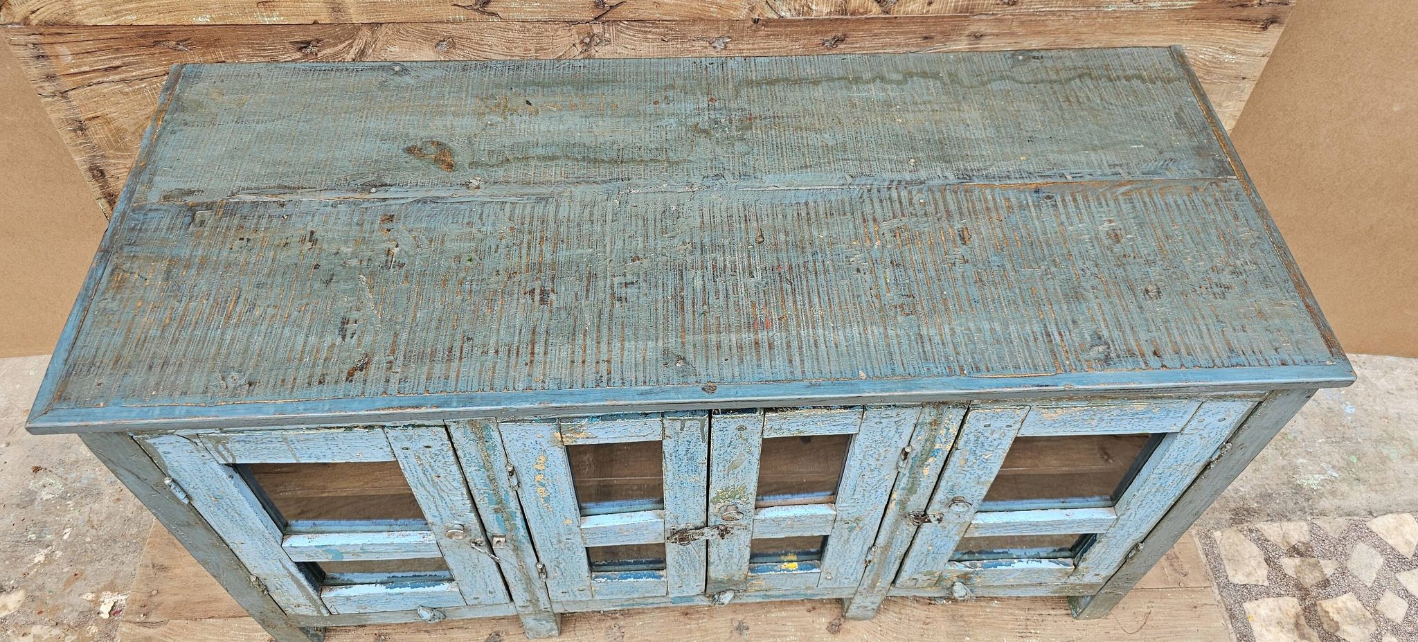 Antique glass-fronted buffet in Burmese teak