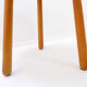 Vintage solid wood side table with rounded legs.