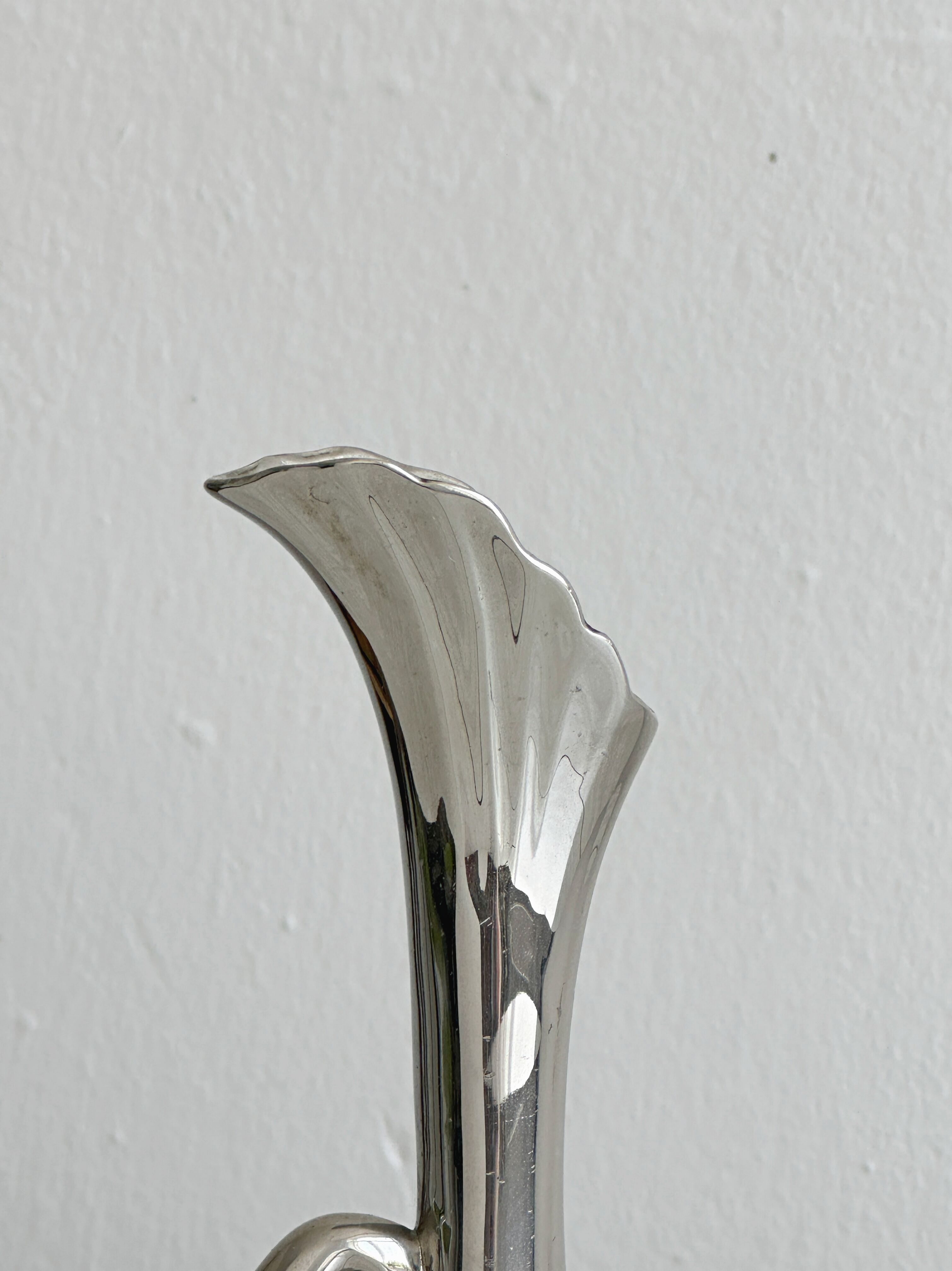 Shiny metal vintage soliflore