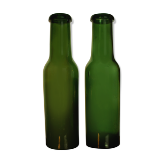 2 old bottles of glass bubbled truffle jars