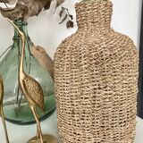 Glass bottle and braided rope