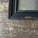 19th century blackened mirror with pitted glass 34cm x 40cm