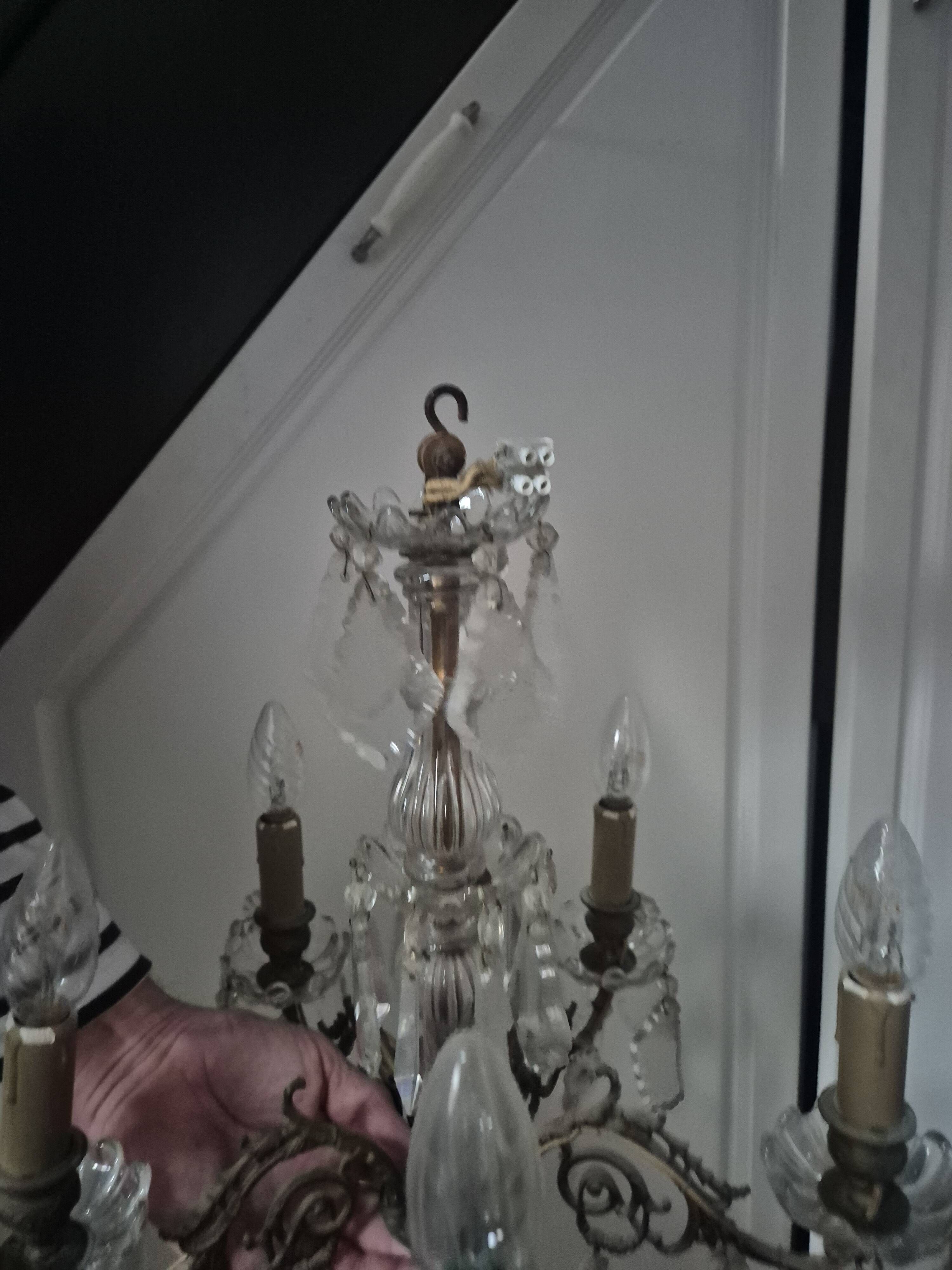 vintage pendant light from the 60s 70s with glass pendants and 5 candle holders