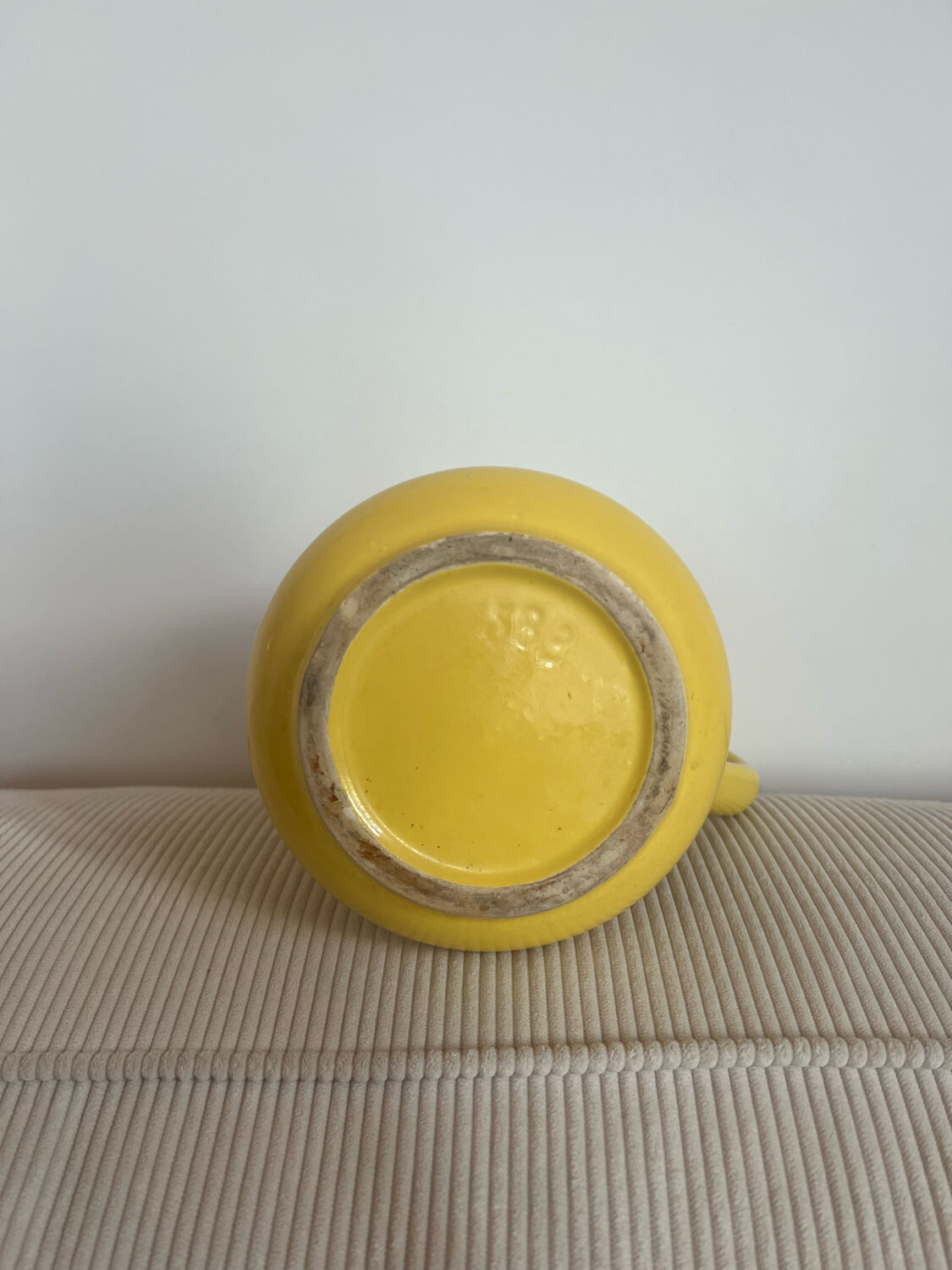 Vintage ceramic yellow pitcher