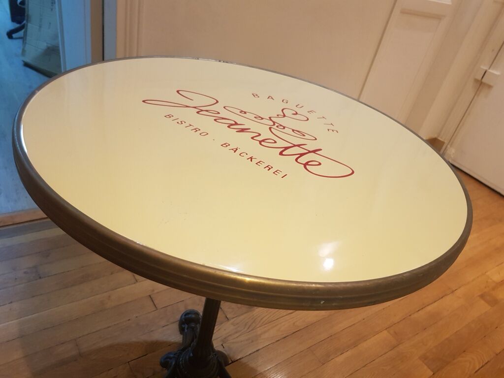 Jeanette bistro table d70 cm enamelled tray surrounded brass brushed molded foot tripod black cast