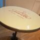 Jeanette bistro table d70 cm enamelled tray surrounded brass brushed molded foot tripod black cast