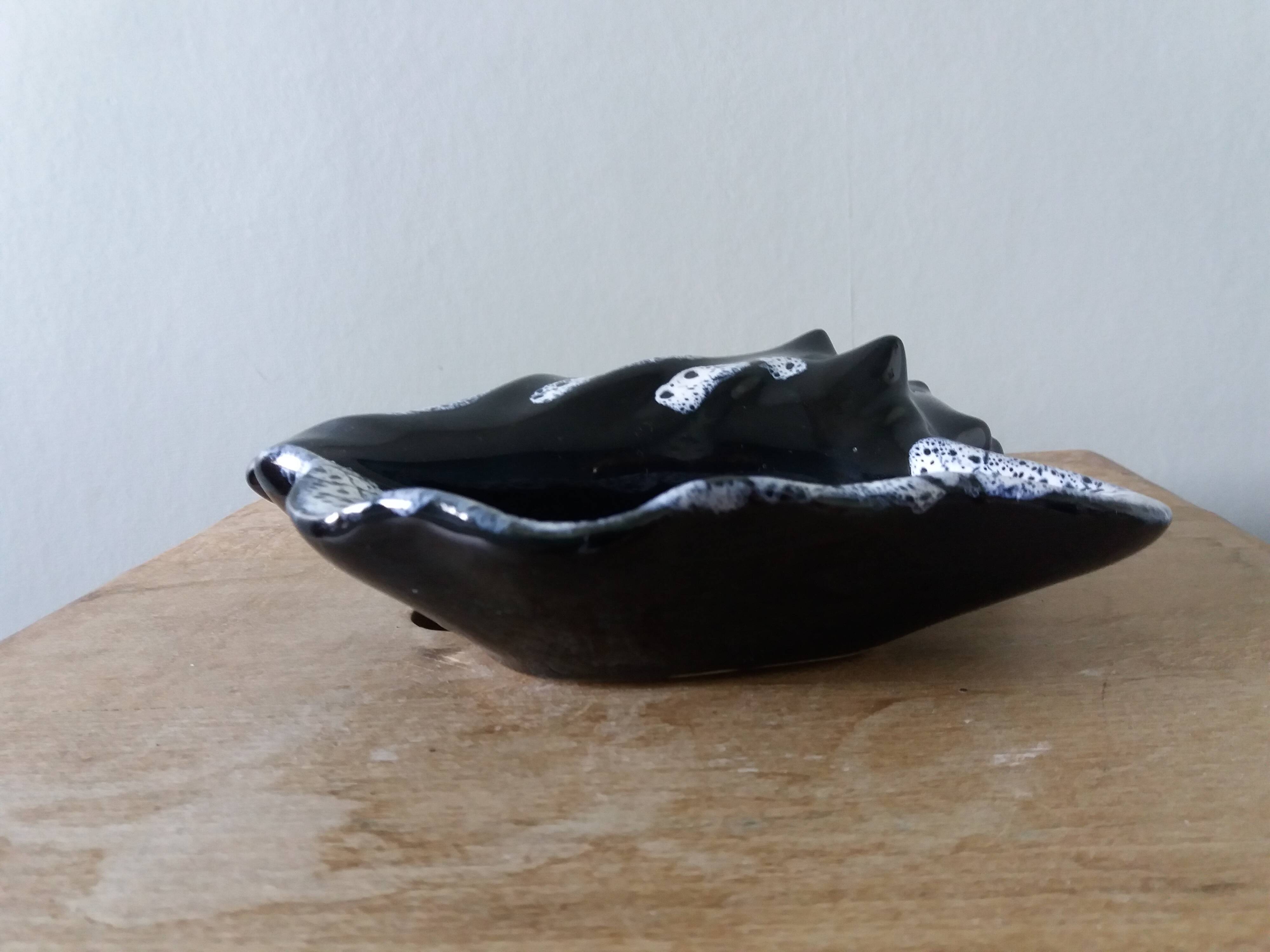 Black ceramic and foam shell ashtray