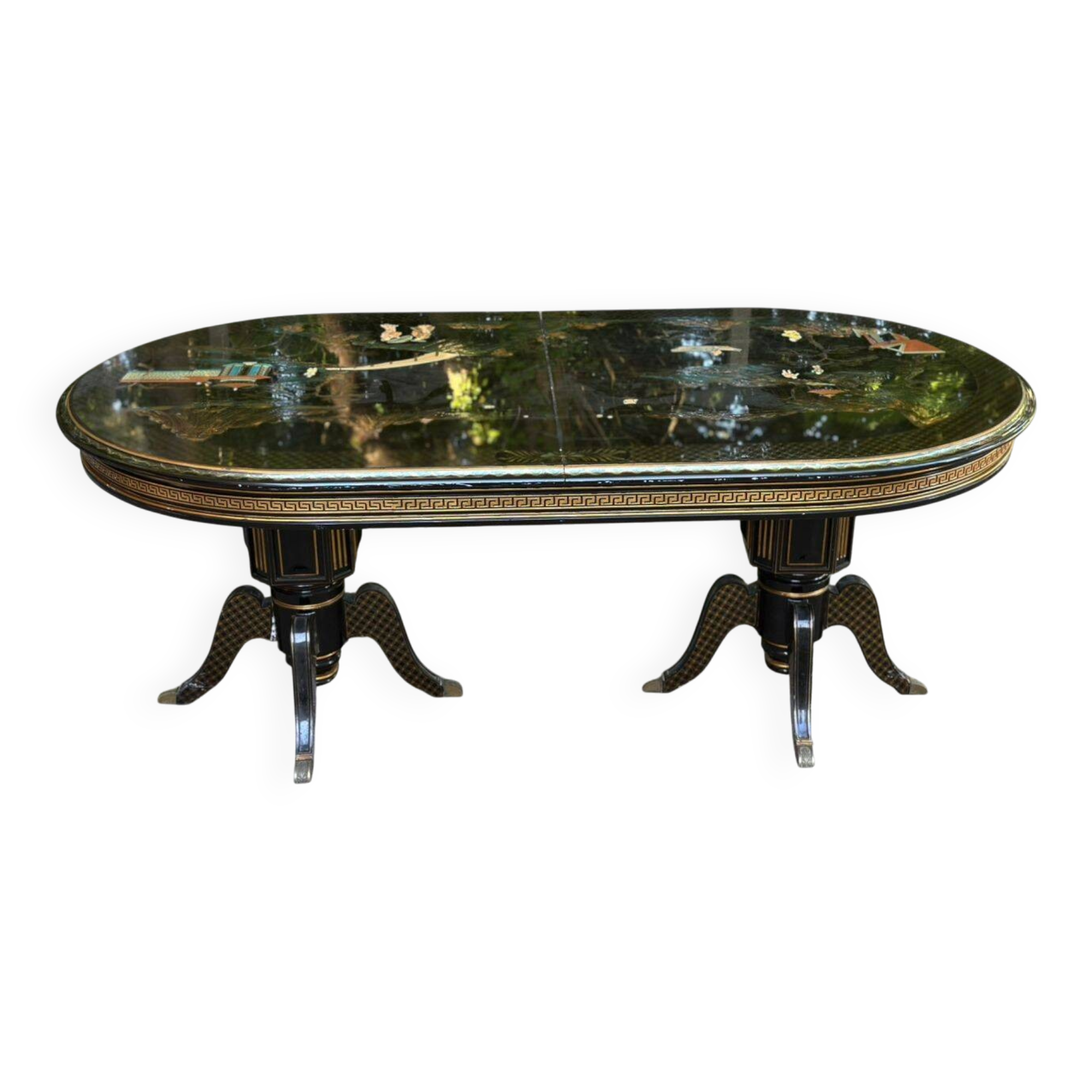 Extendable oval dining table in lacquered Chinoiserie style from the year.