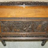 Chinese hand-carved desk from around 1940 with matching chair.