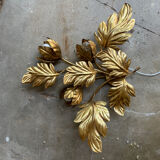 Golden wall lamp foliage