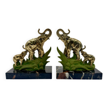 Art Deco bookends with elephants in brass and marble.