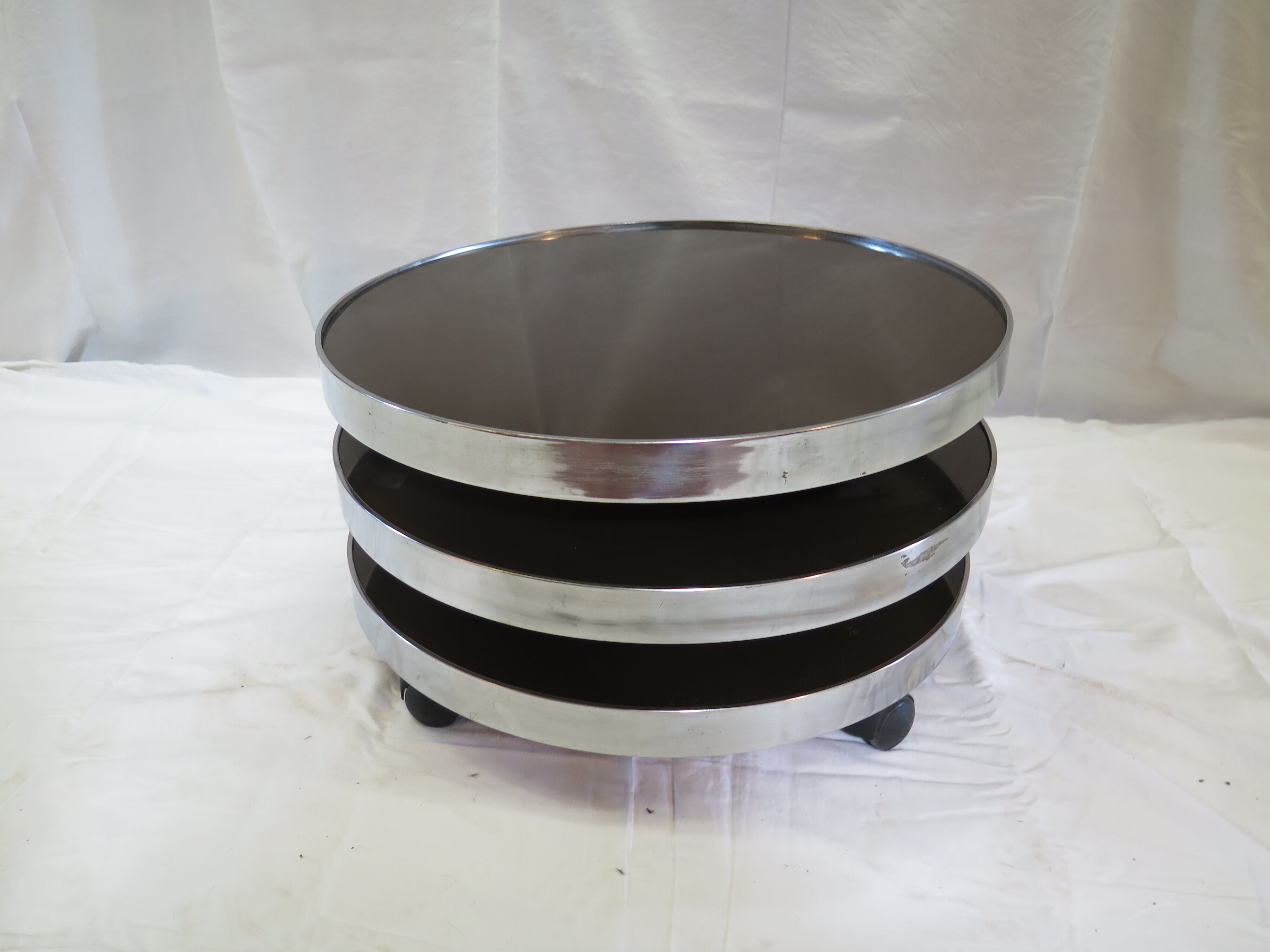 Round coffee table with 3 pivoting trays Maria Pergay for Mercier