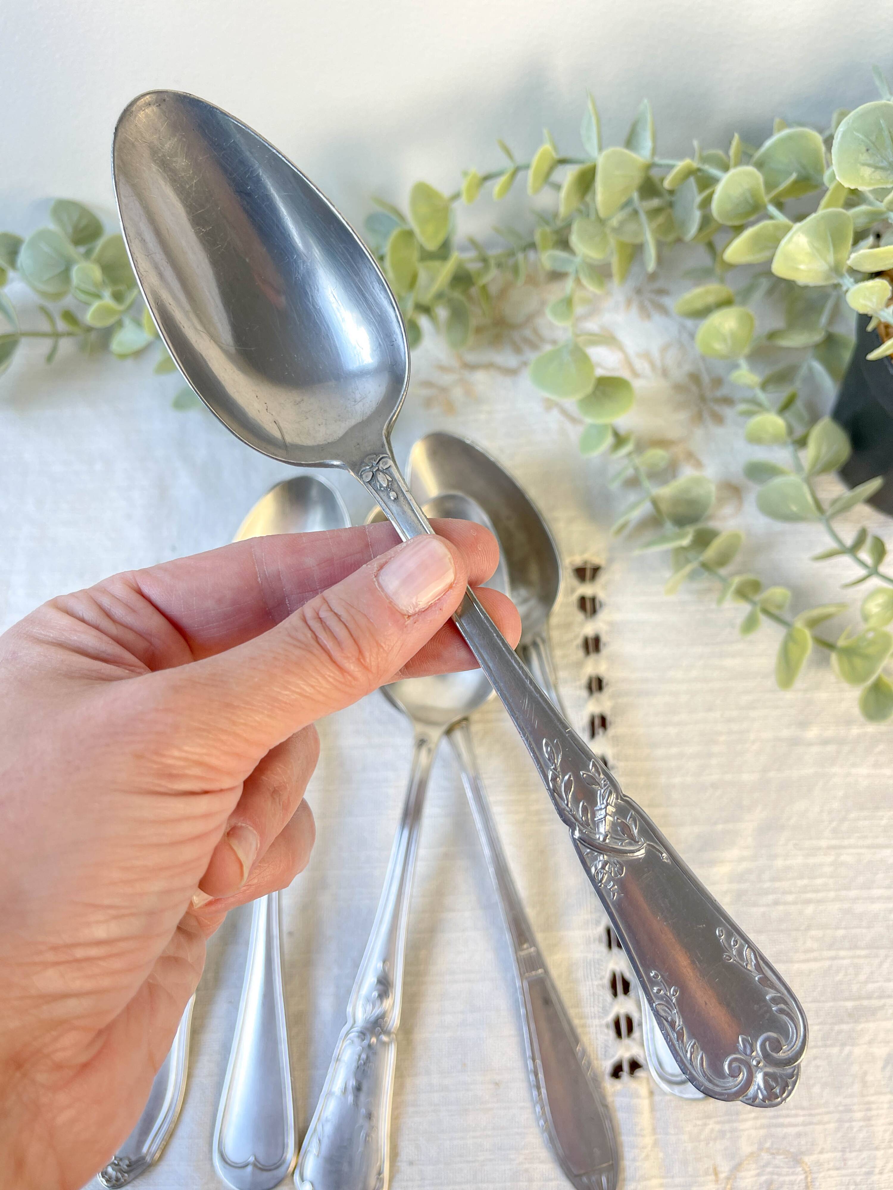 Set of 6 mismatched vintage soup spoons