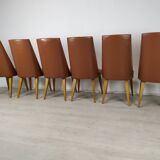 8 brown skai chairs 1950