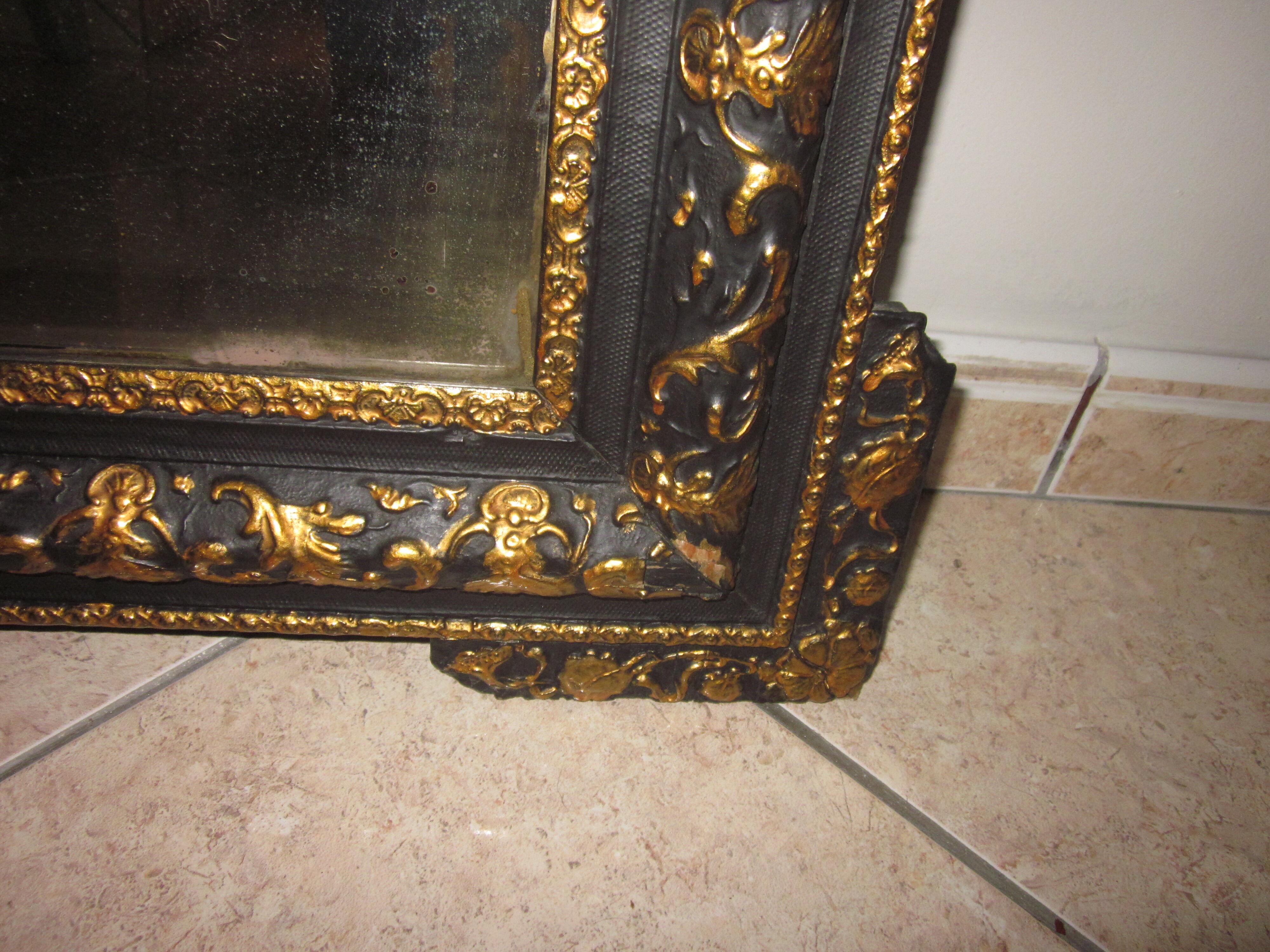 Old mirror with pediment