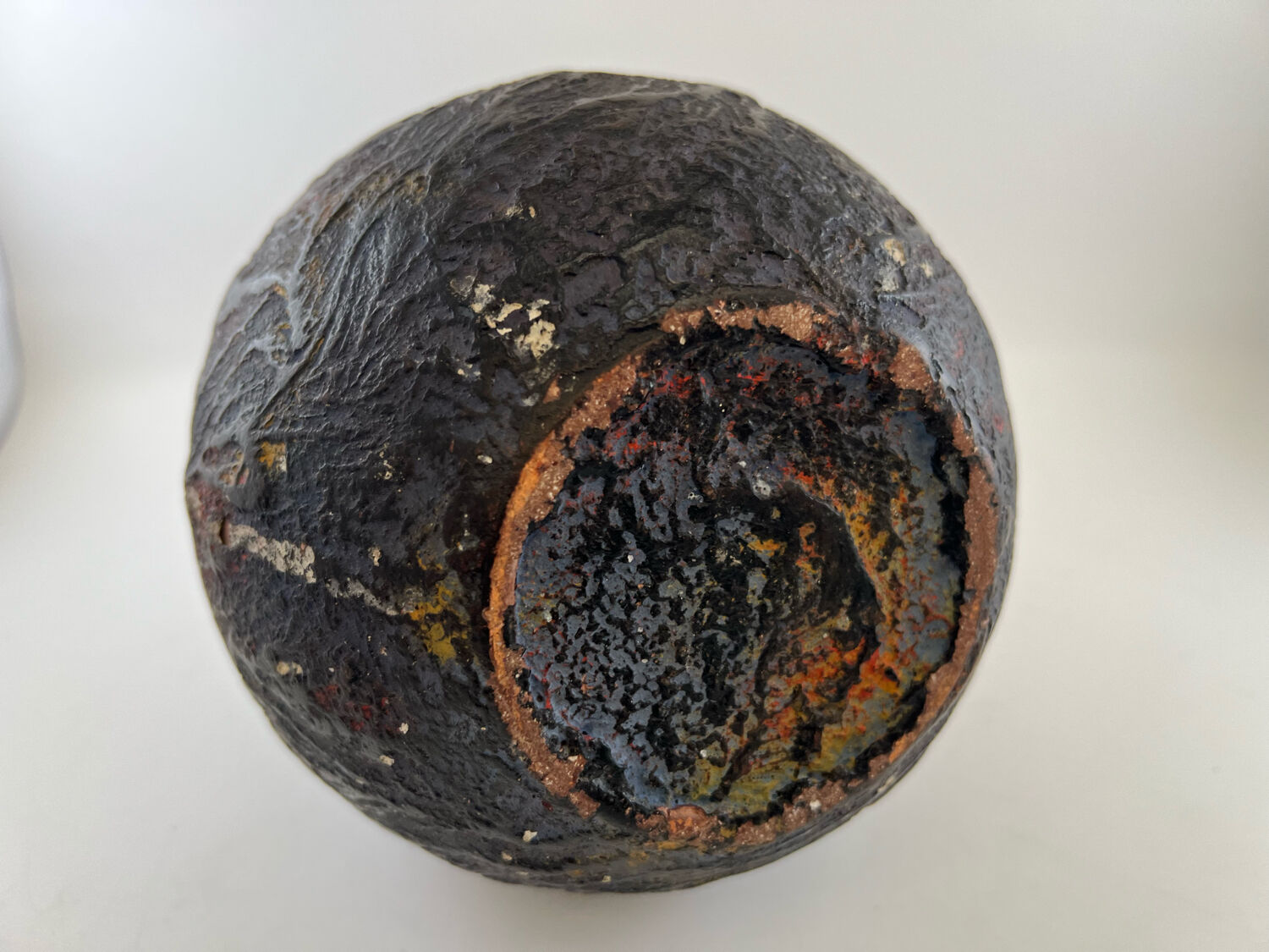 Iridescent black ball vase